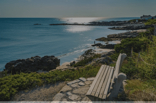 Bench on Ogunquit Beach overlooking the Atlantic Ocean