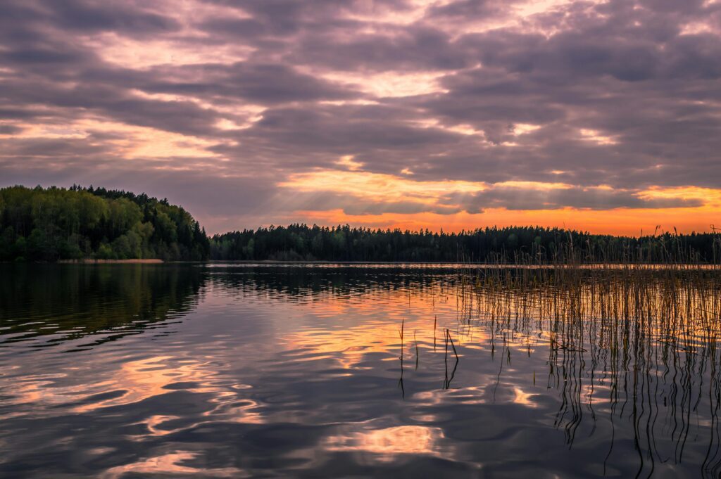 providence getaway to a Maine sunset over a pristine pond